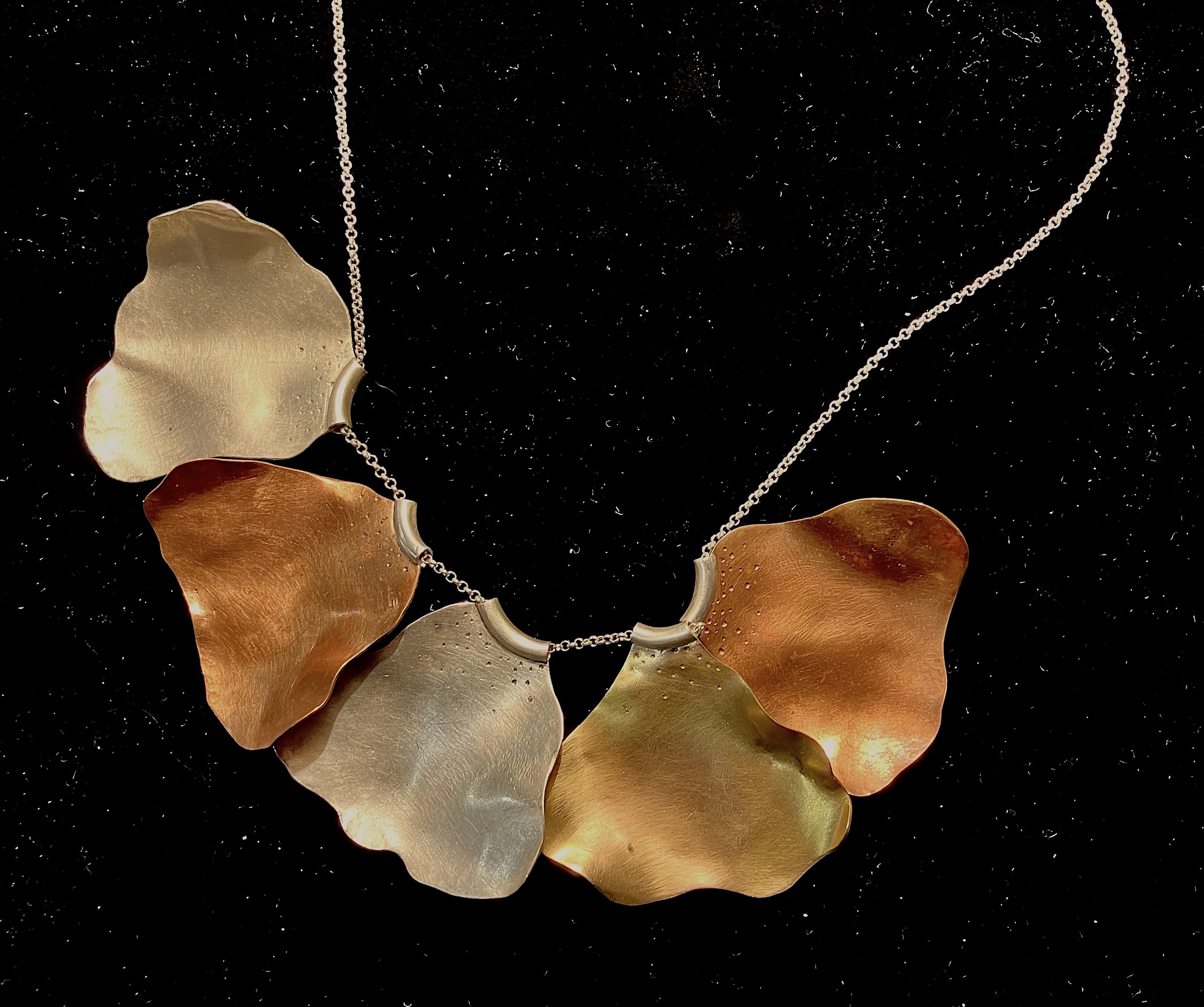 Handwrought jewelry — intricate silverwork